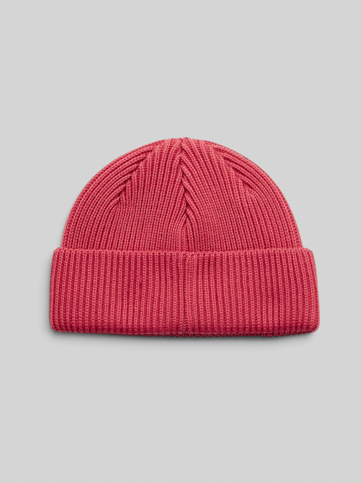 Baffle Haus Trophy Beanie in red merino wool with a fisherman fit and ribbed knit texture