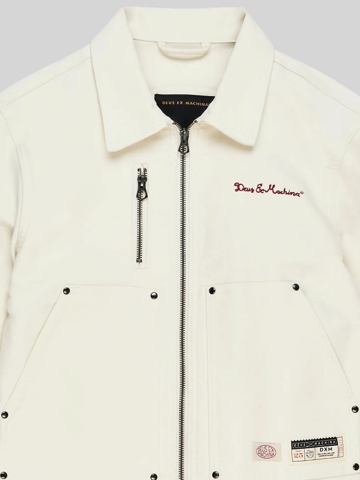 Baffle Haus Trophy jacket in whisper white cotton moleskin with front zip, rivet-detailed pockets, and logo embroidery