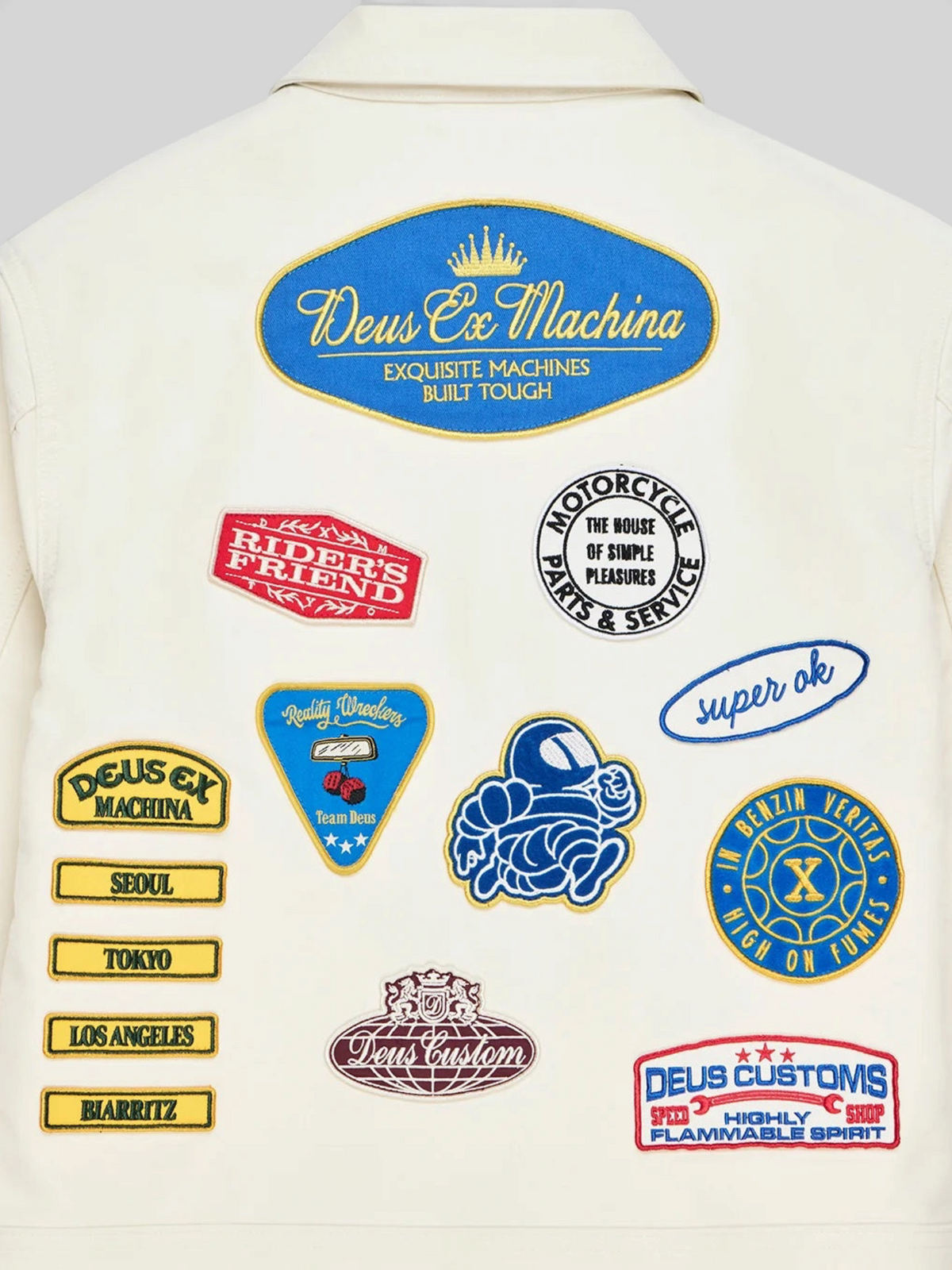 Baffle Haus Trophy Jacket in whisper white cotton moleskin featuring various colourful embroidered graphic patches