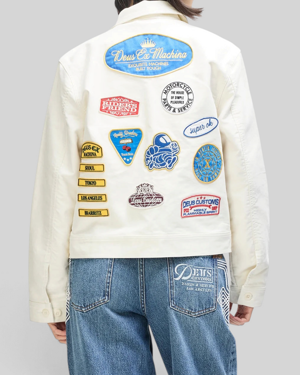 Baffle Haus Trophy Jacket in whisper white cotton moleskin featuring multiple vintage-style embroidered patches