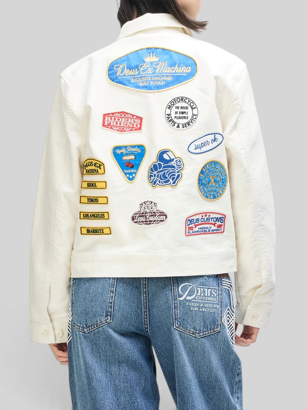 Baffle Haus Trophy Jacket in whisper white cotton moleskin featuring multiple vintage-style embroidered patches