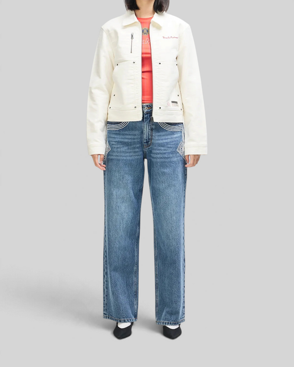 Baffle Haus Trophy Jacket in whisper white cotton moleskin with front patch pockets and rivet detailing on a model