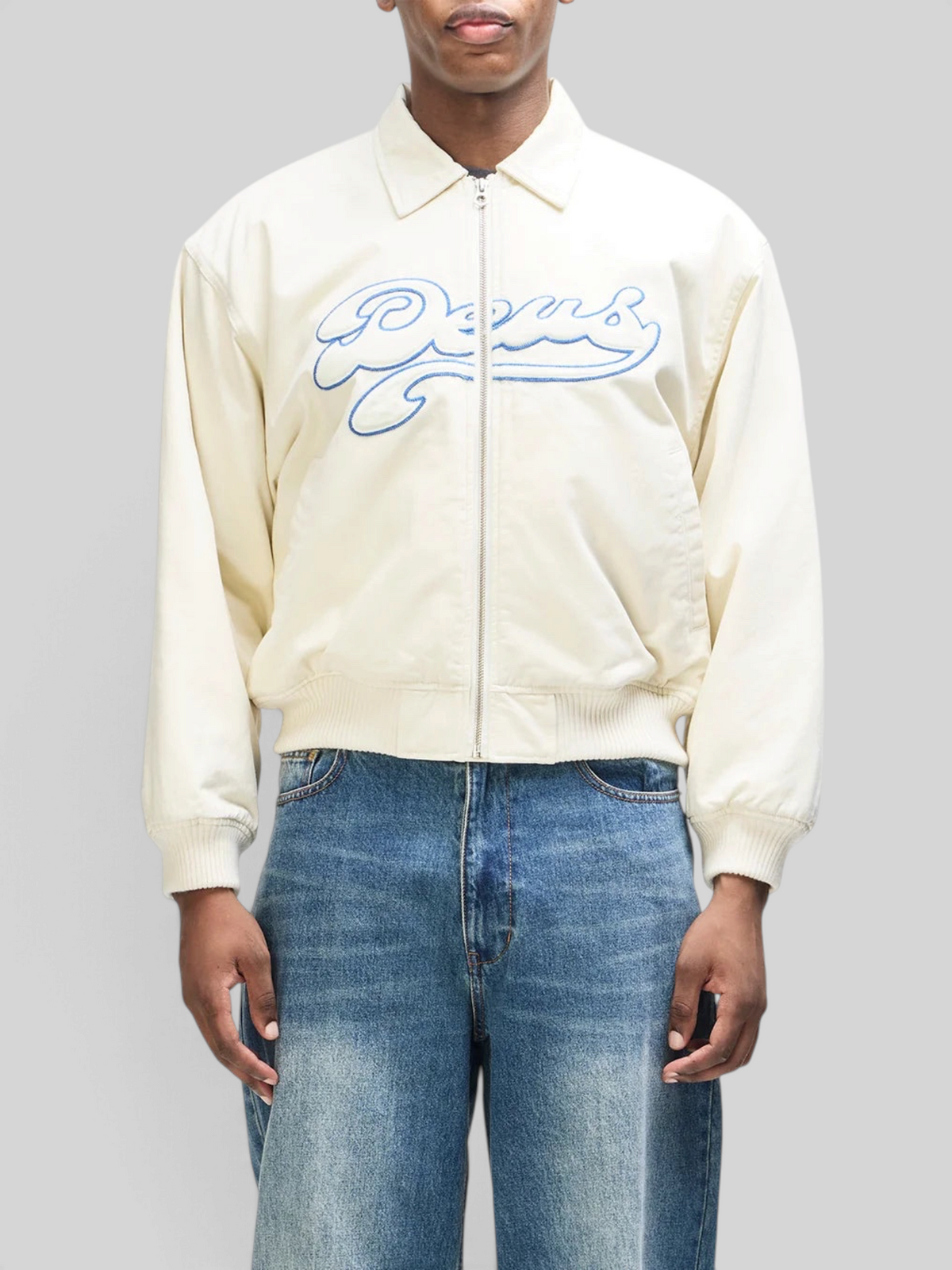 Baffle Haus Runner-Up jacket in whisper white cotton twill with blue Deus velvet applique and ribbed cuffs