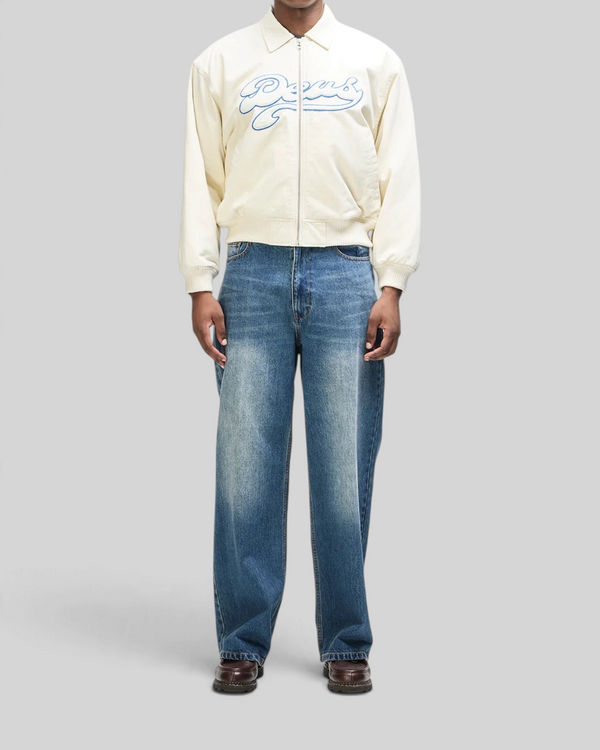 Baffle Haus Runner-Up jacket in whisper white cotton twill with blue velvet Deus applique and ribbed hem