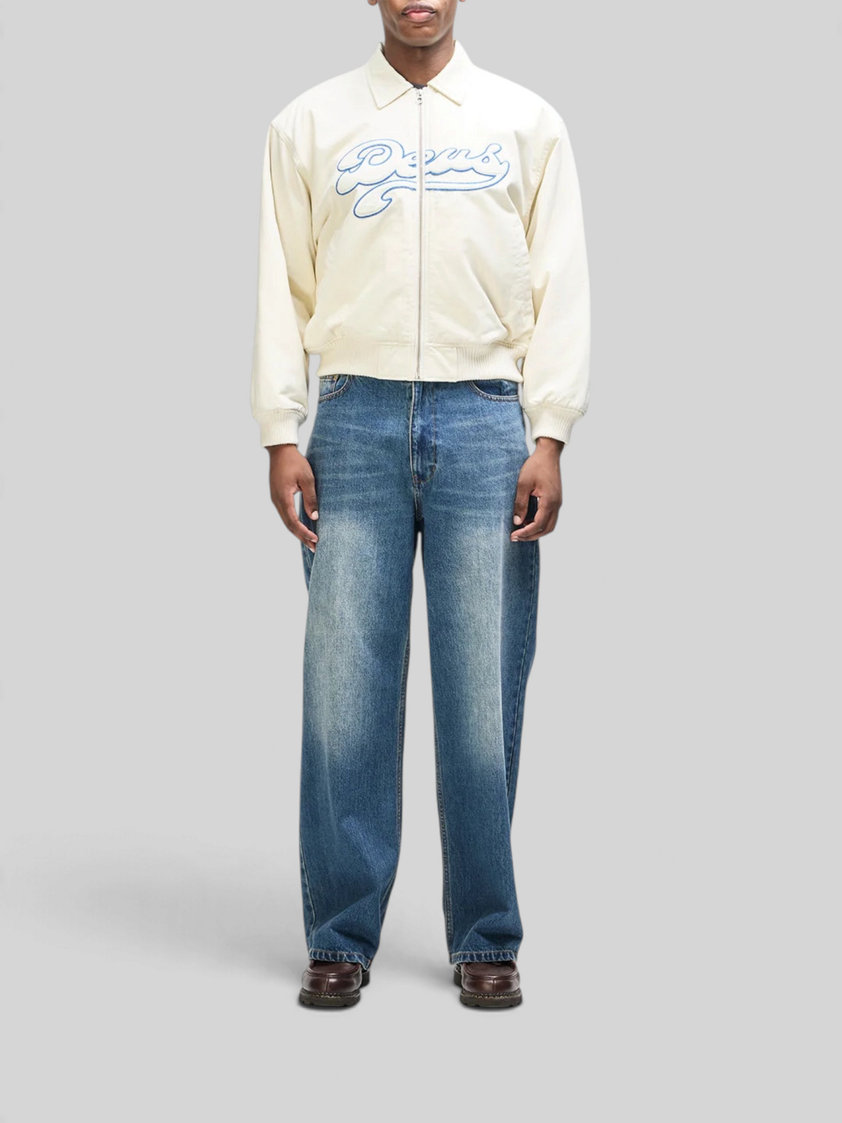 Baffle Haus Runner-Up jacket in whisper white cotton twill with blue velvet Deus applique and ribbed hem