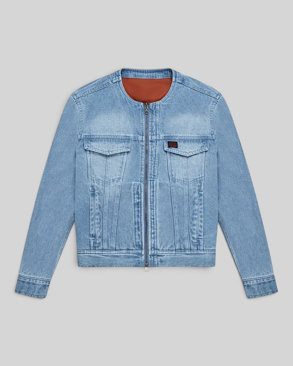 Baffle Haus Br 163 reversible denim jacket in light blue with a rust-coloured nylon interior and double zip closure.
