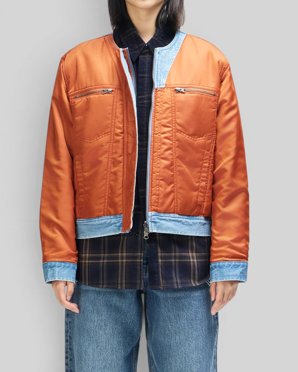 Baffle Haus Br 163 reversible jacket in rust nylon and indigo denim with utility zip pockets and denim trim