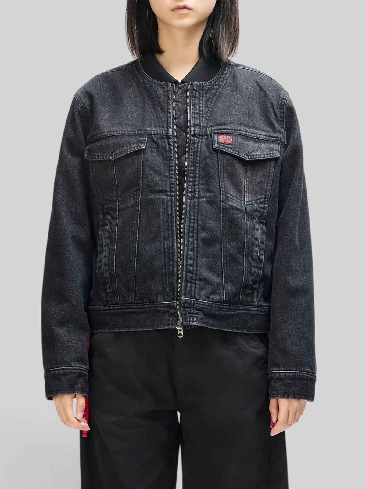 Baffle Haus Br 163 reversible phantom black denim jacket with zip closure and chest pockets worn by a model
