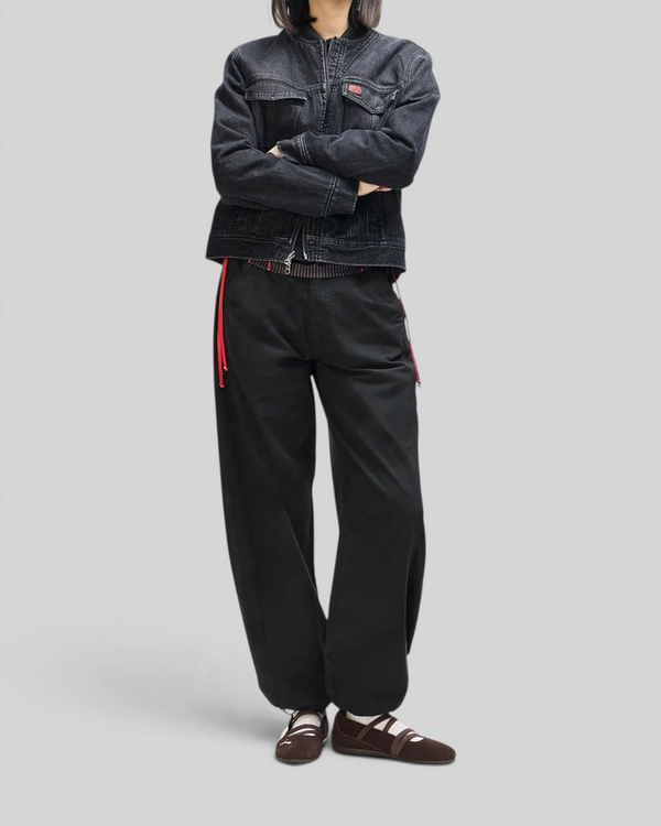 Baffle Haus Br 163 reversible phantom-black denim jacket worn by a model with arms crossed
