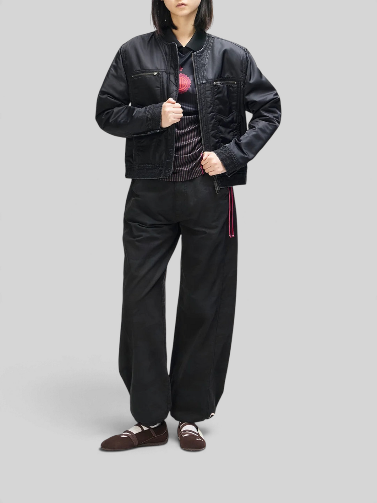 Baffle Haus Br 163 reversible black nylon and denim jacket worn by a model with matching black trousers