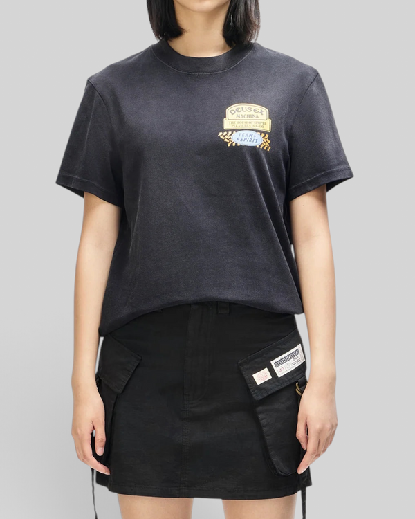 Baffle Haus Daphne Tee in anthracite grey pigment-dyed cotton with a small Deus Ex Machina chest pocket print