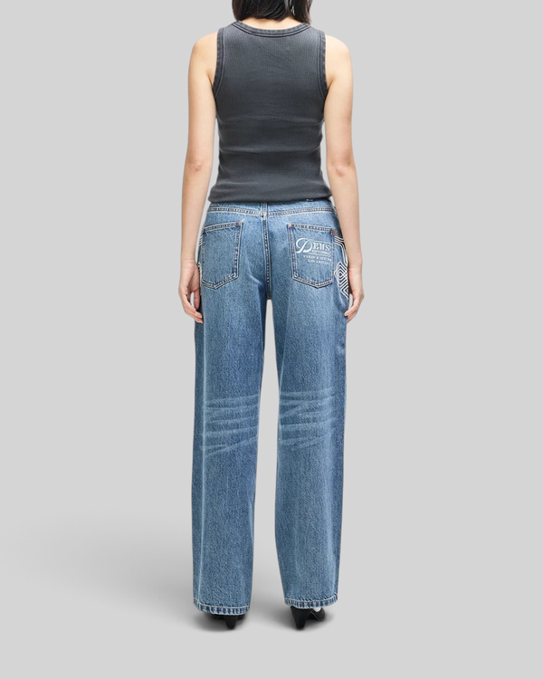 Baffle Haus anthracite grey ribbed cotton tank top worn with blue denim jeans, back view on a model