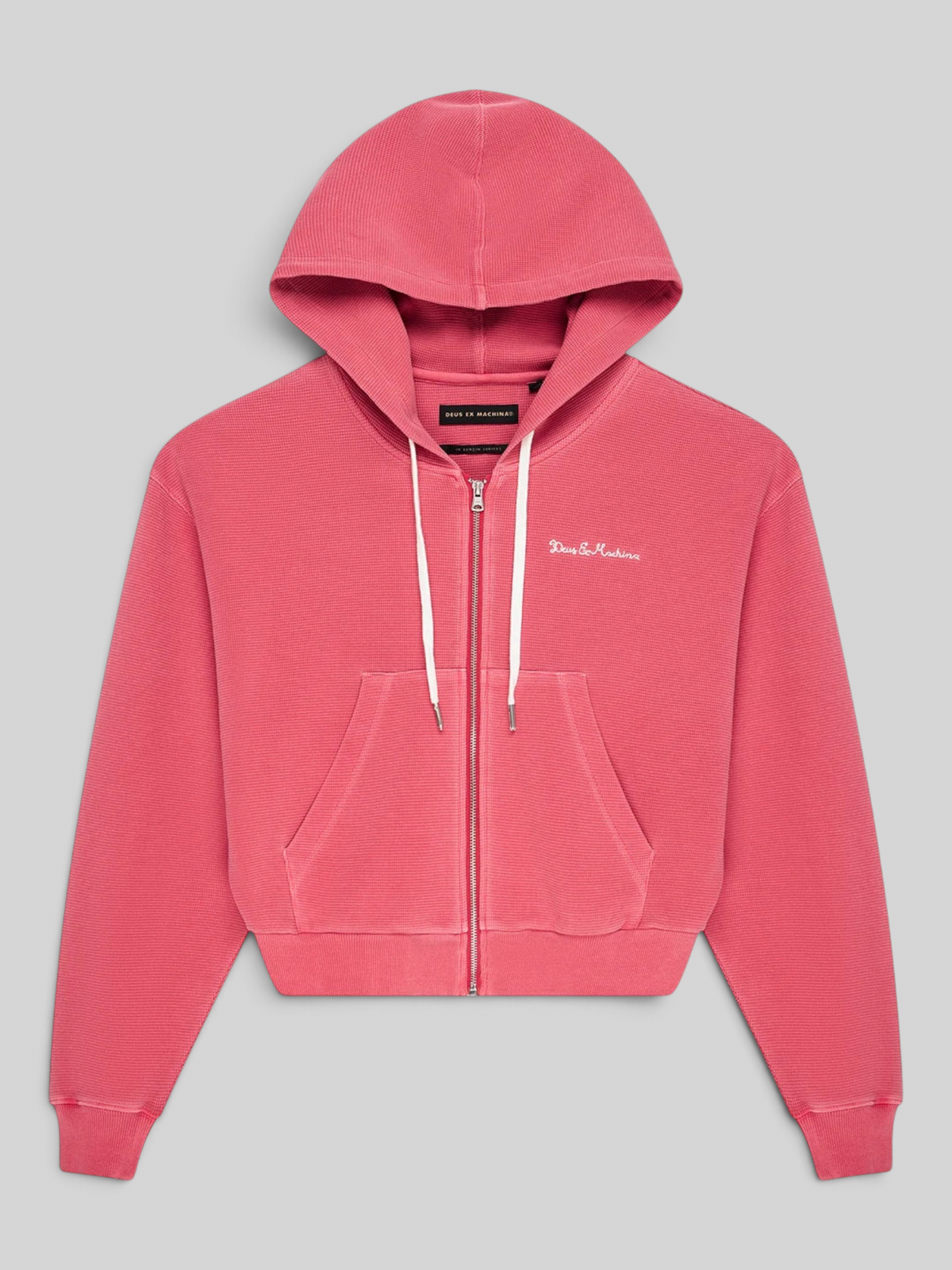 Baffle Haus Poinsettia Red waffle knit zip-up hoodie with Deus Ex Machina chest embroidery and white drawstrings.