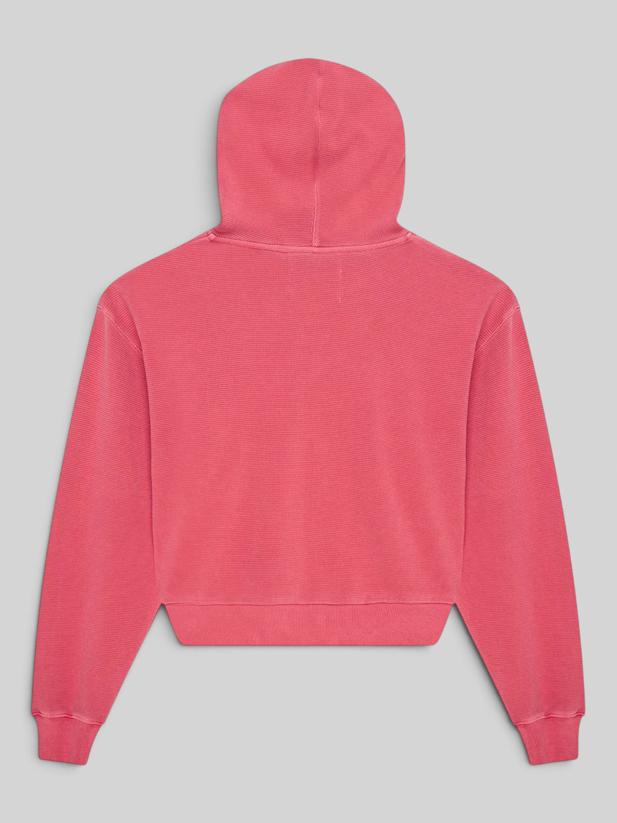 Back view of Baffle Haus Poinsettia Red relaxed fit waffle knit cotton hoodie with a pigment dyed finish.