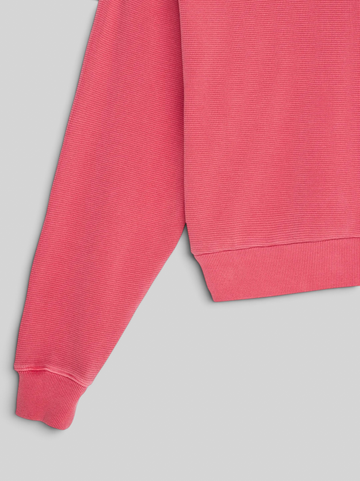 Baffle Haus poinsettia red waffle knit cotton hoodie with a relaxed fit and pigment dyed finish