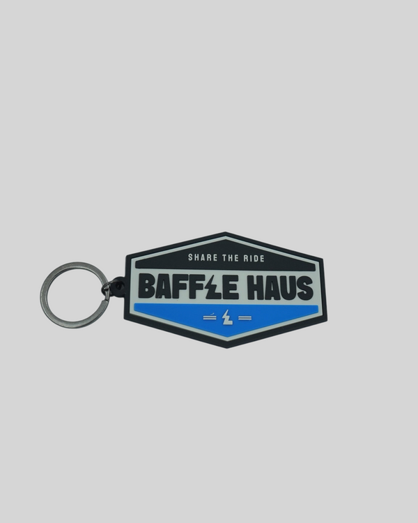 Baffle Haus blue and black embossed PVC retro key tag with debossed logo and metal split-ring keyring