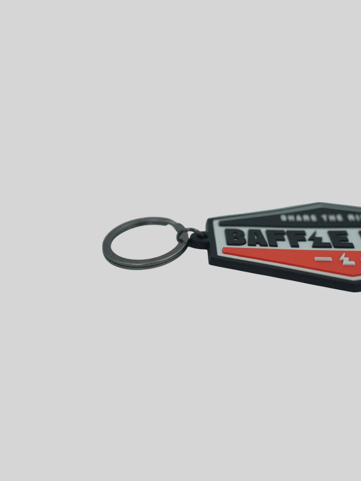 Baffle Haus orange retro key tag made from durable embossed PVC with a metal split-ring keyring.