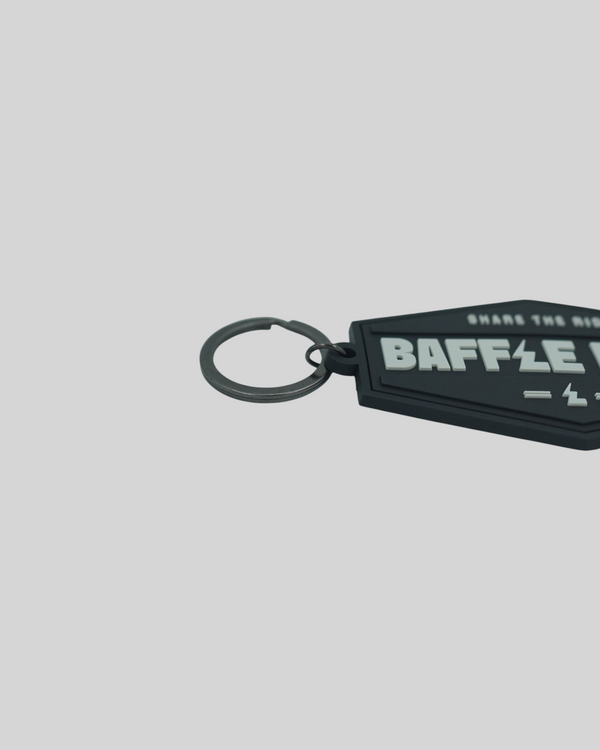 Baffle Haus black retro key tag made of durable embossed PVC with a debossed logo and metal split-ring