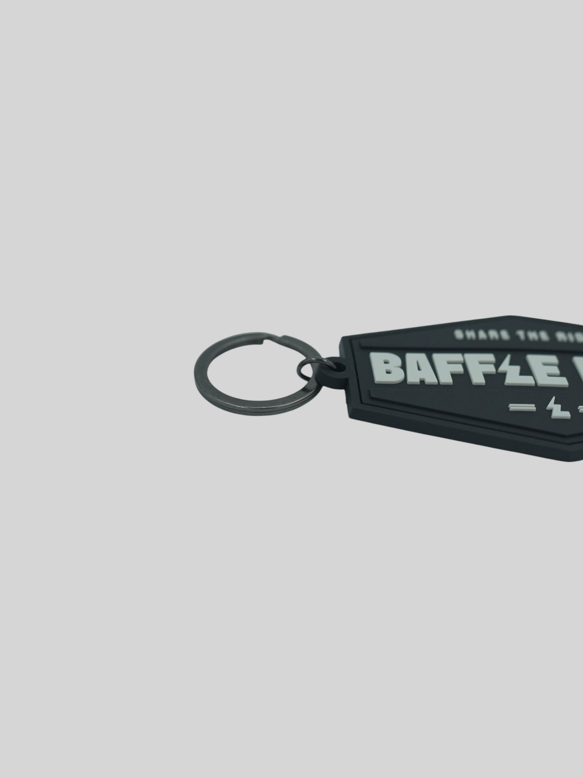 Baffle Haus black retro key tag made of durable embossed PVC with a debossed logo and metal split-ring