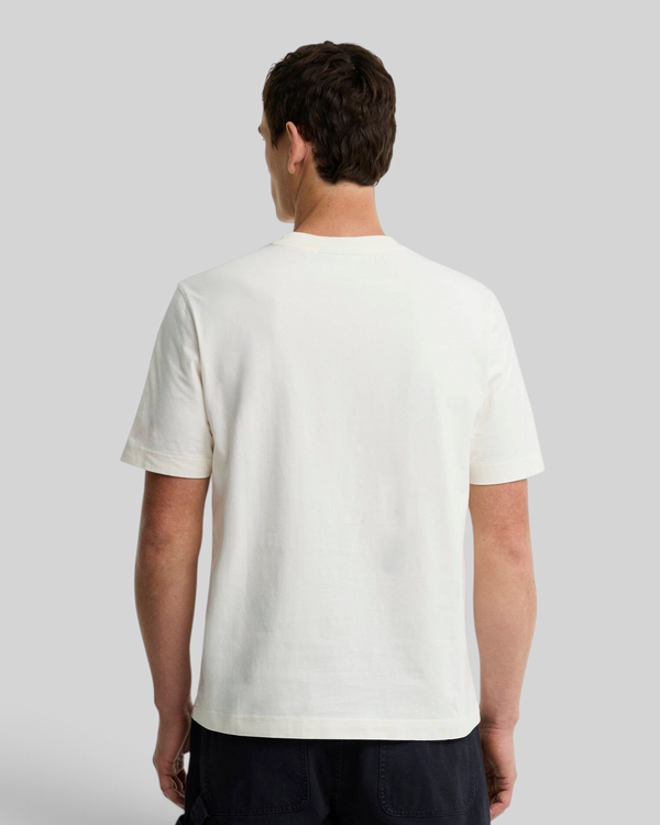 Back view of a man wearing a Baffle Haus Barbour Wadsworth relaxed fit whisper white cotton t-shirt