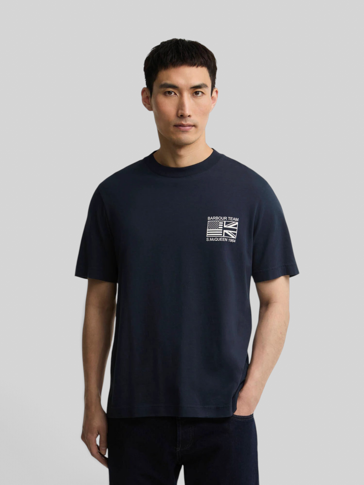 Baffle Haus navy cotton crew neck t-shirt featuring a white Steve McQueen graphic print on the chest