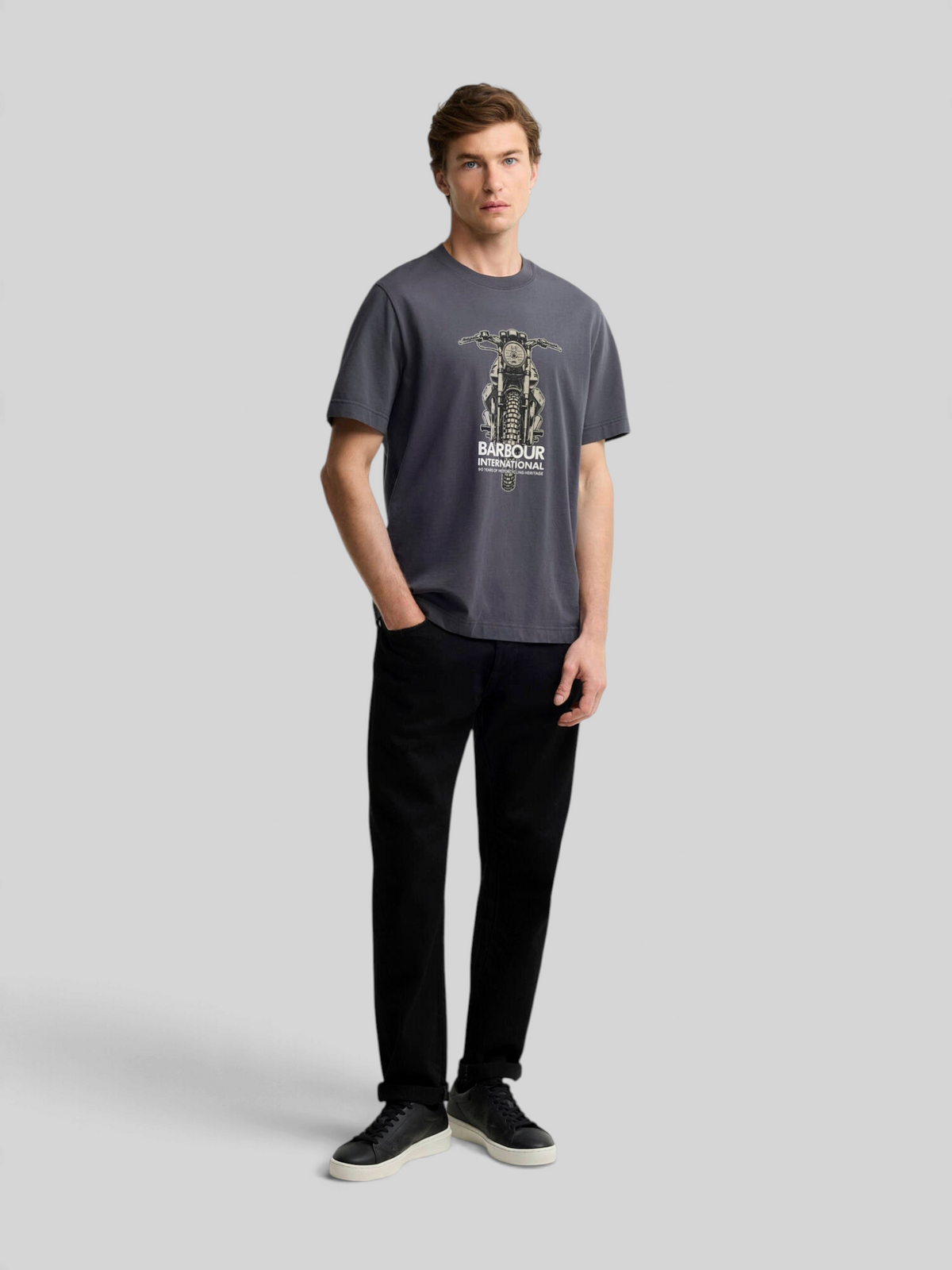 Baffle Haus Barbour International asphalt grey cotton crew neck t-shirt with front motorbike graphic on a male model