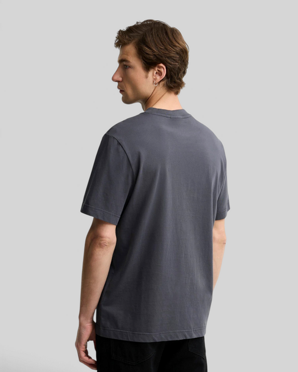 Baffle Haus Barbour International Causey graphic t-shirt in asphalt grey cotton jersey, back view on a male model.