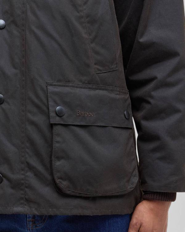 Baffle Haus olive Barbour Bedale waxed cotton jacket featuring a bellows pocket with branded stud fastening