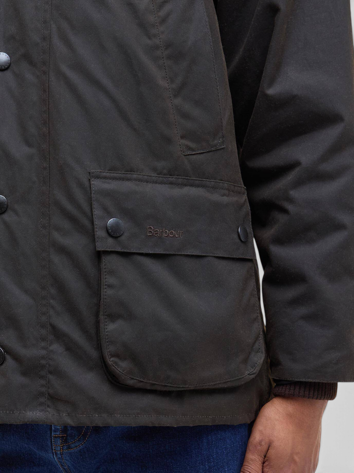Baffle Haus olive Barbour Bedale waxed cotton jacket featuring a bellows pocket with branded stud fastening