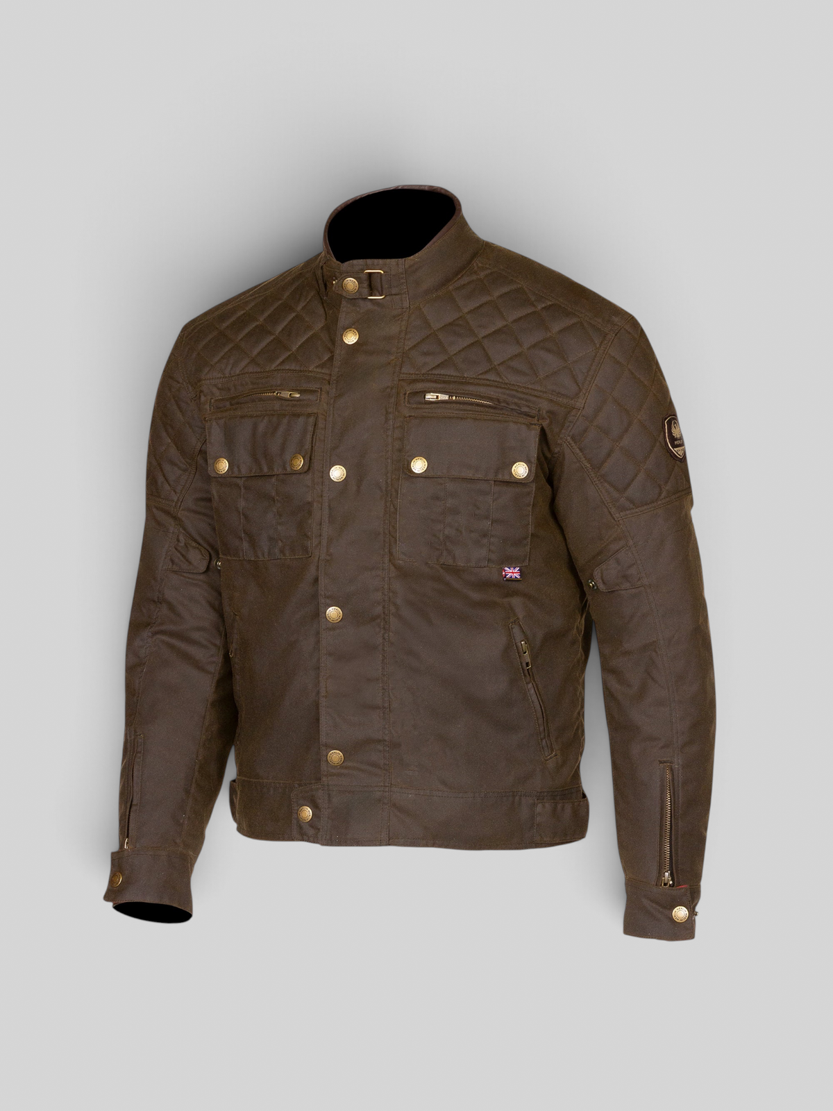 Baffle Haus Stanton AAA olive waxed cotton motorcycle jacket with quilted shoulders and brass hardware details.