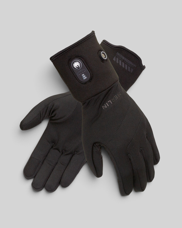 Baffle Haus Merlin Thermavolt black heated motorcycle liner gloves with battery power button and indicator lights.