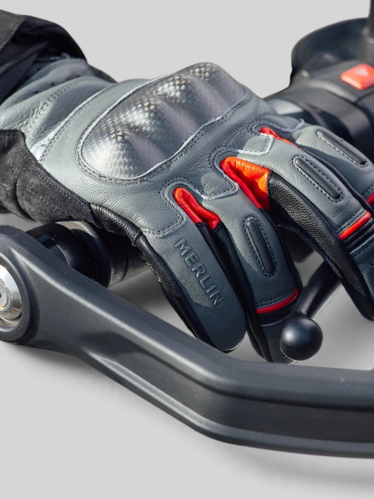 Baffle Haus Overland Air D3O grey goatskin leather motorcycle glove with carbon fibre knuckle and red accents