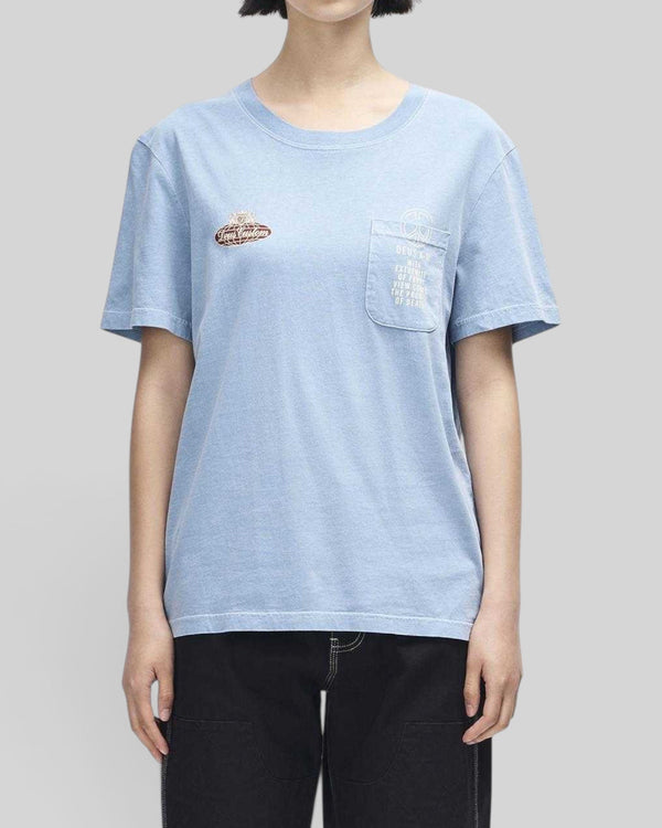 Baffle Haus A110 women's lightweight windward blue recycled cotton blend t-shirt with chest pocket and graphic print.