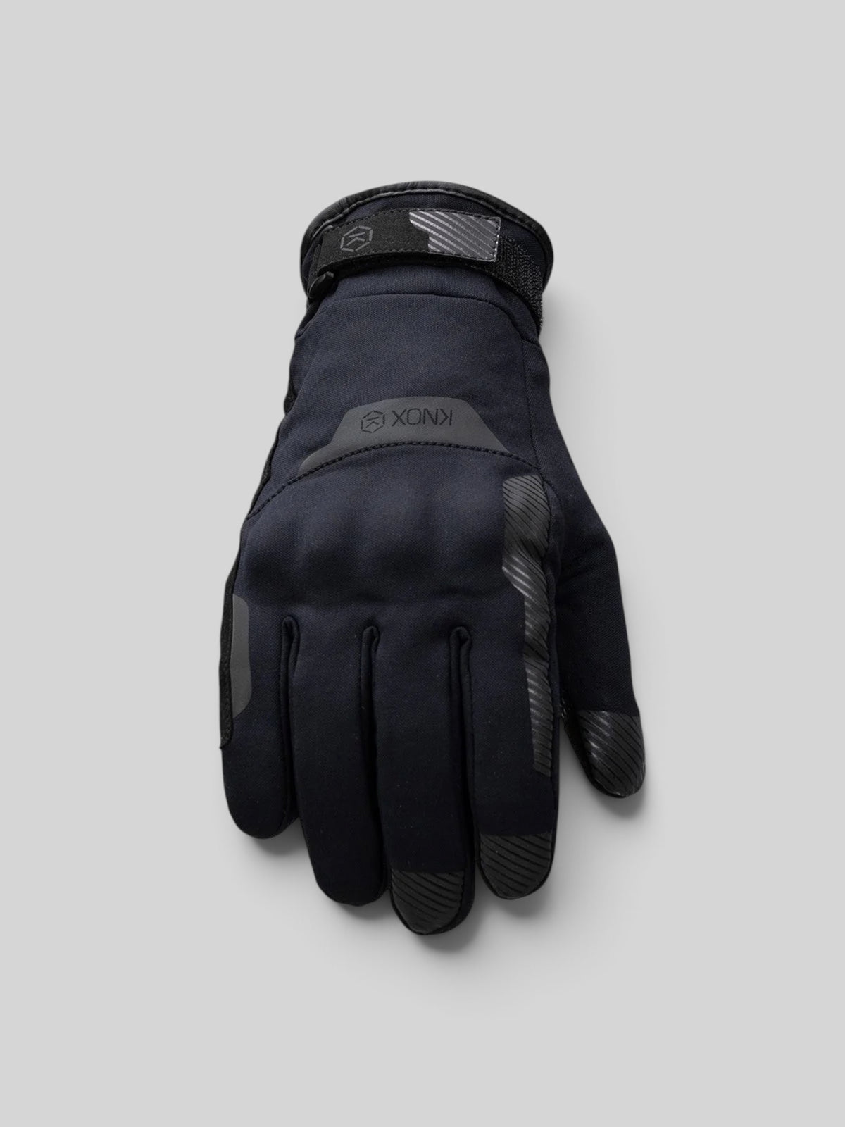 Baffle Haus Action Pro waterproof motorcycle glove in black featuring HDry technology and Micro-Lock knuckle protection.