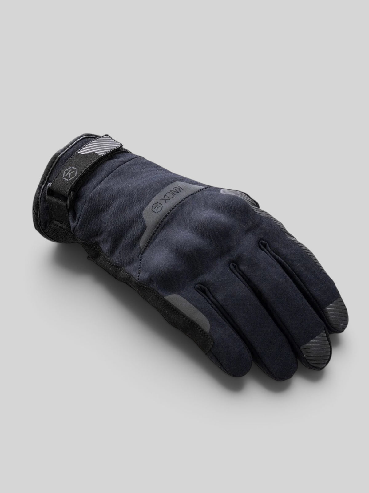 Baffle Haus Action Pro waterproof motorcycle glove in black featuring HDry technology and Micro-Lock knuckle protection.