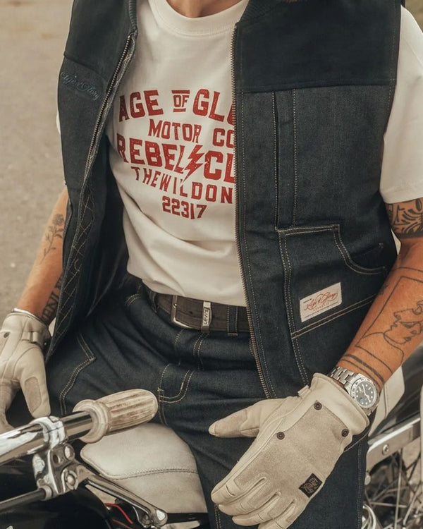 Baffle Haus Age of Glory Crafter gloves in aged white leather worn by a rider on a vintage motorcycle