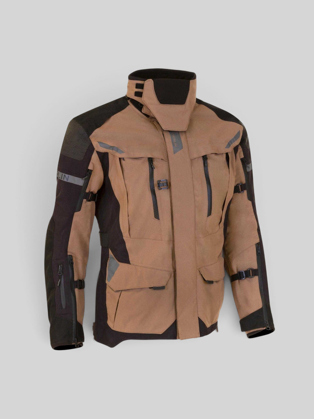 Baffle Haus Akashi Pro laminated adventure motorcycle jacket in desert tan with black accents and waterproof zippers.