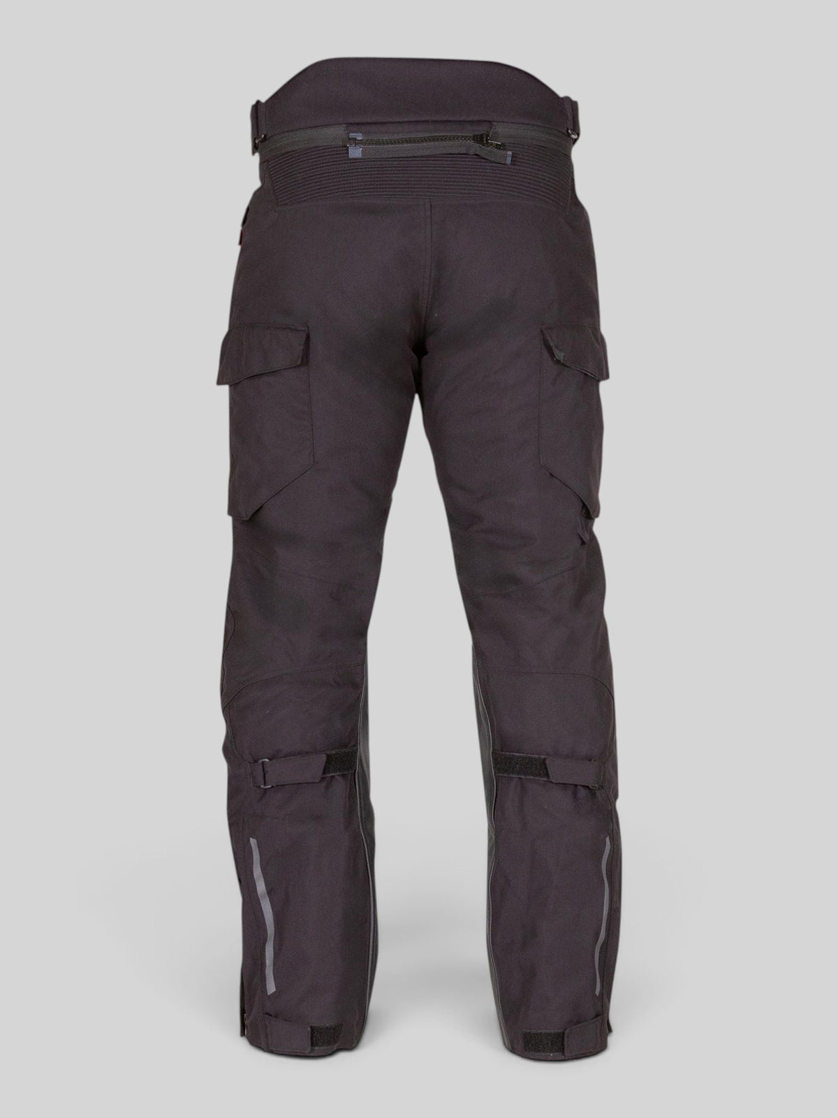 Baffle Haus Akashi Pro black laminated motorcycle trousers with cargo pockets and reflective details, rear view