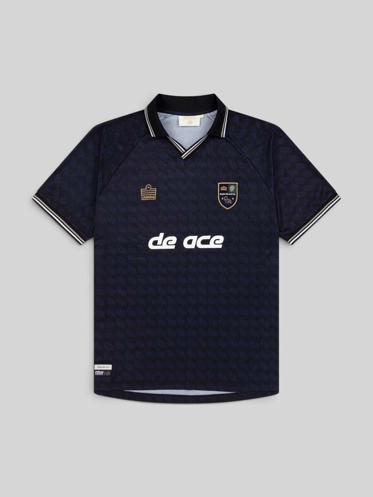 Baffle Haus Alma De Ace navy blue football home jersey with a collared neckline and patterned fabric design.
