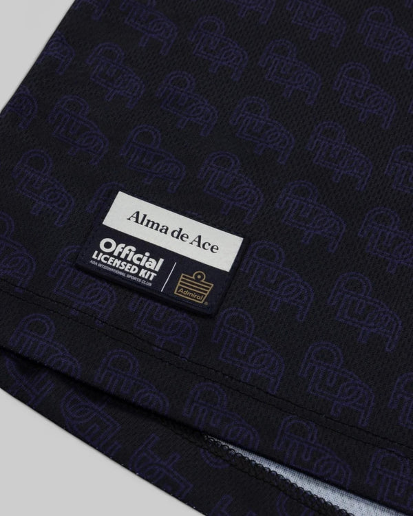 Baffle Haus Alma De Ace navy blue football top with repeating logo pattern and official licensed kit patch