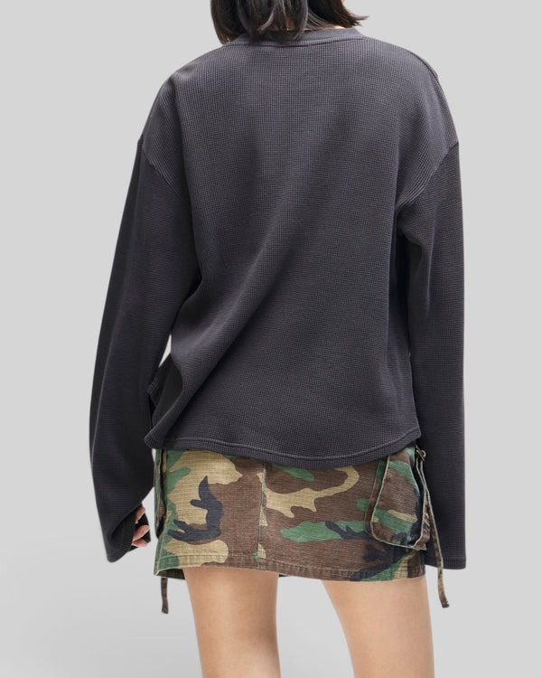 Baffle Haus anthracite grey long sleeve waffle knit top with a relaxed fit, shown from the back on a model.