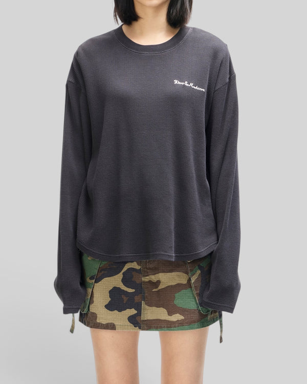 Baffle Haus anthracite grey long sleeve waffle knit top with Deus Ex Machina chest embroidery on a model