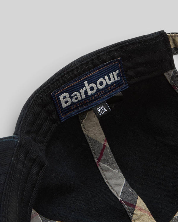 Baffle Haus Barbour Cascade sports cap interior label showing cotton construction and tartan lining detail