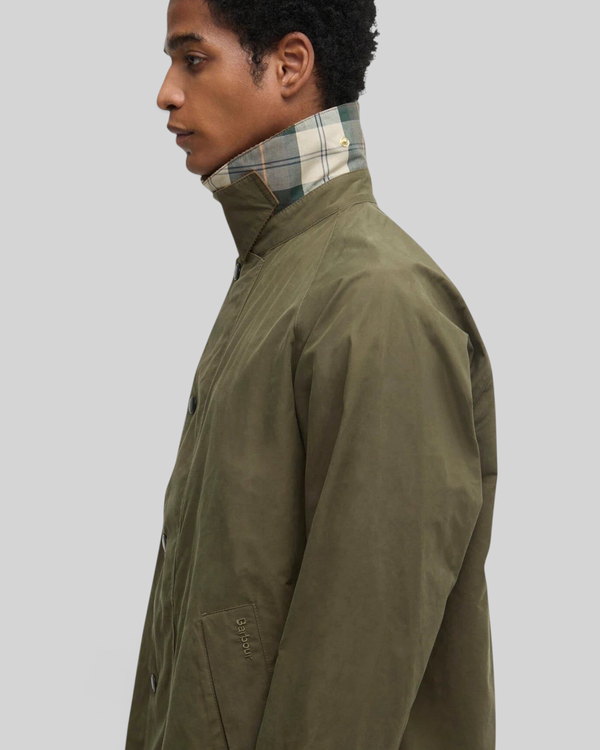 Baffle Haus Barbour Icons Transport casual jacket in ivy green with a signature tartan cord collar and side view.