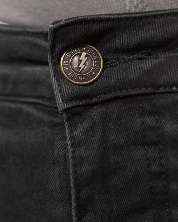 Baffle Haus Betty High black stretch denim jeans featuring a branded metal button closure with a lightning bolt logo.