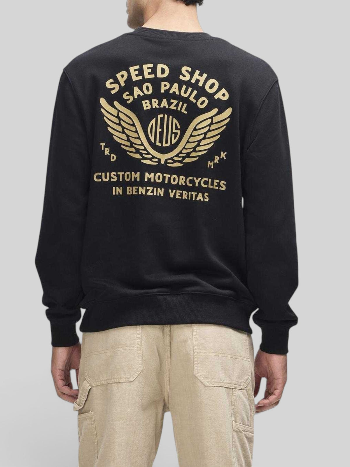 Baffle Haus Munificence black crew fleece with gold Deus Speed Shop graphic print on the back