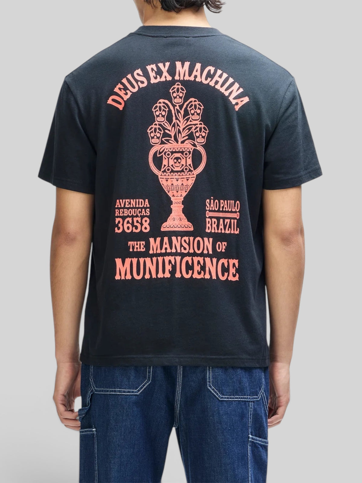 Baffle Haus black box fit t-shirt with peach-colored graphic print on the back featuring a ceramic vase illustration.