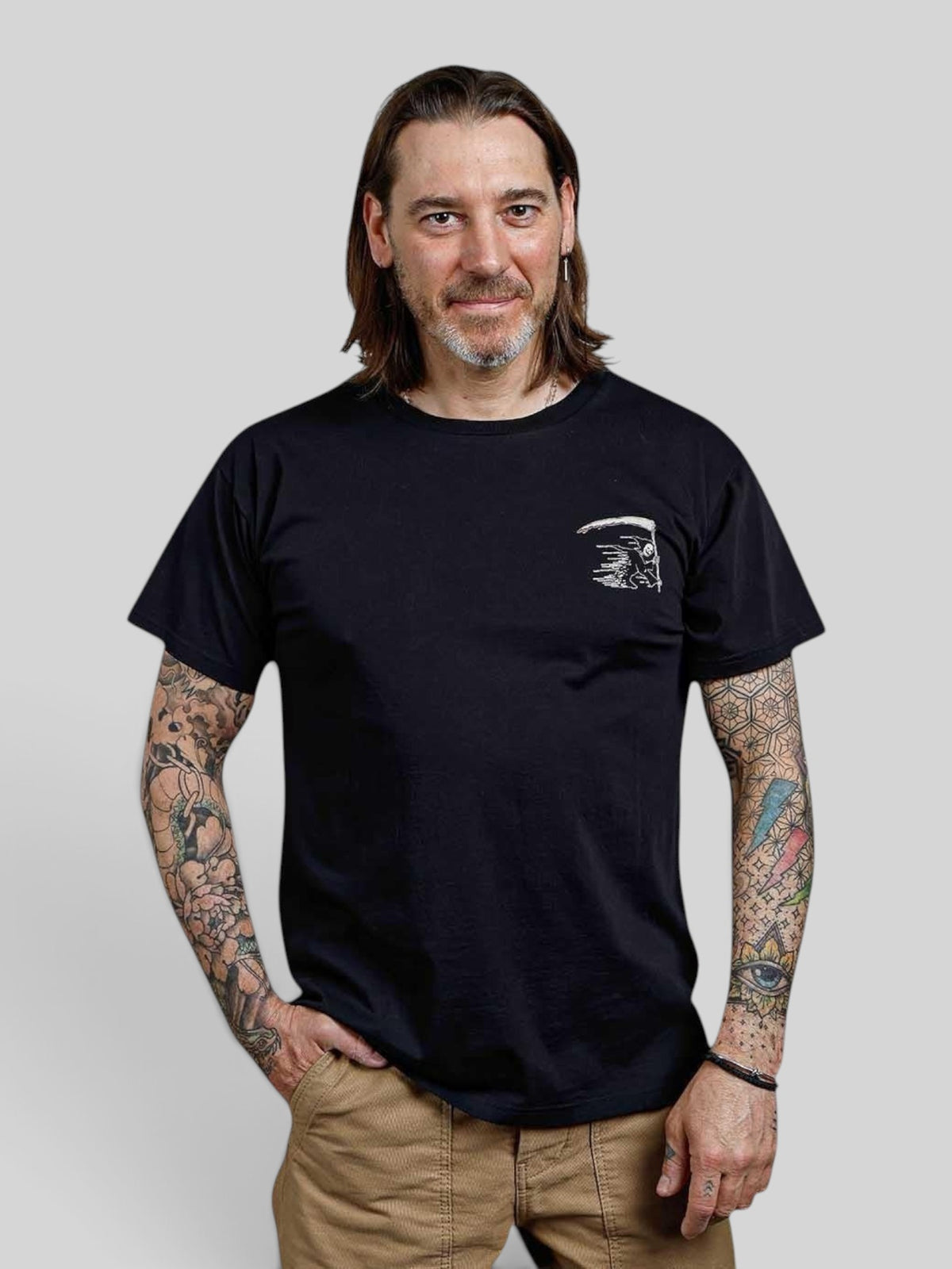 Baffle Haus black 100% cotton sports tee featuring a small white grim reaper graphic on the chest.