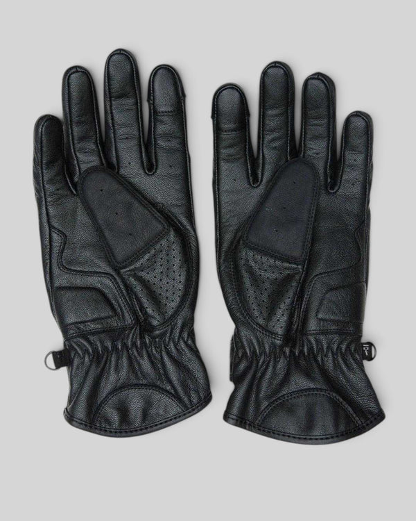 Baffle Haus Rider's Friend black goat nappa leather motorcycle gloves with perforated panels and velcro wrist straps.
