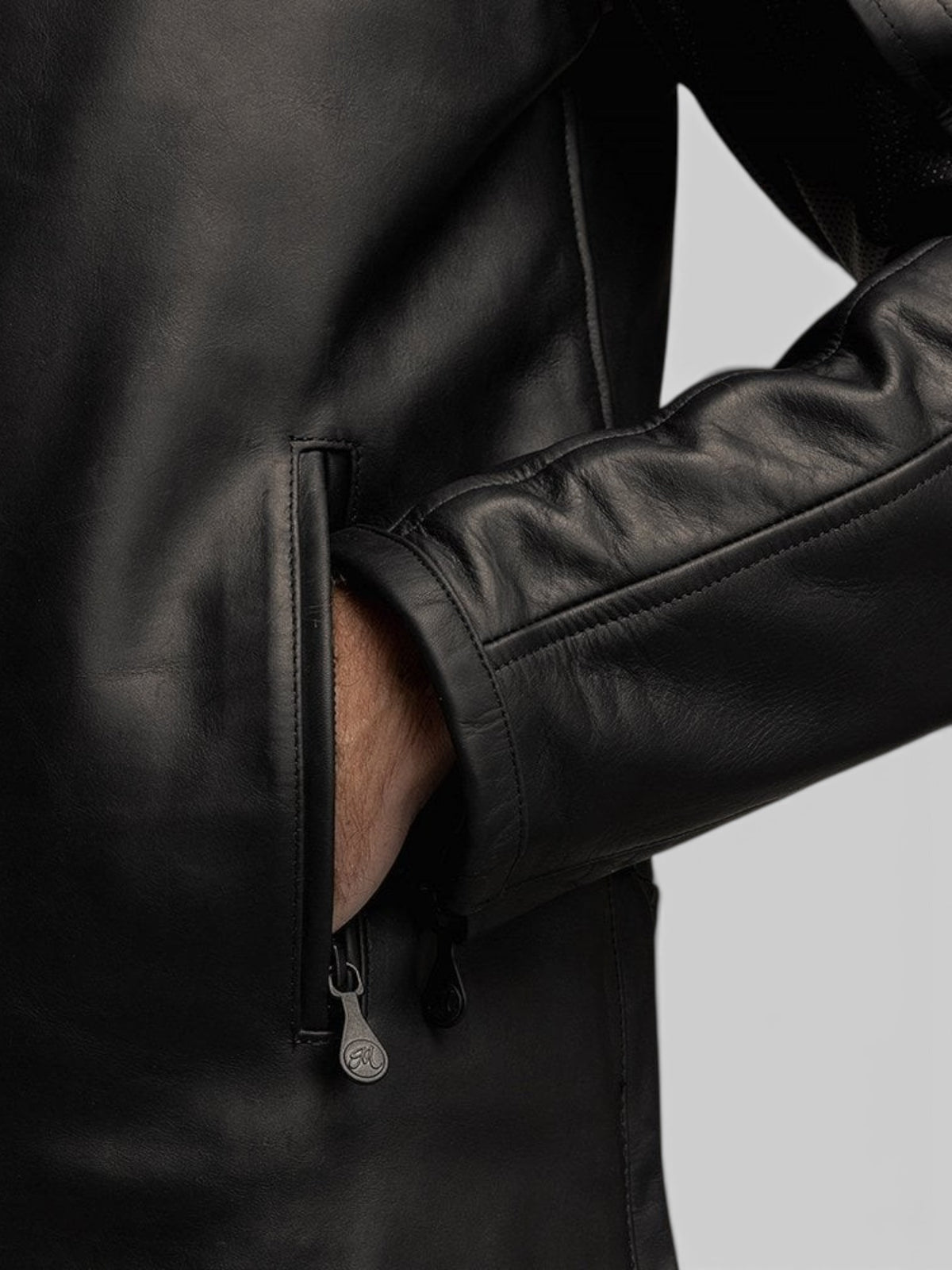Baffle Haus Motone Revolver black cowhide leather riding jacket featuring a zippered hand-warmer pocket